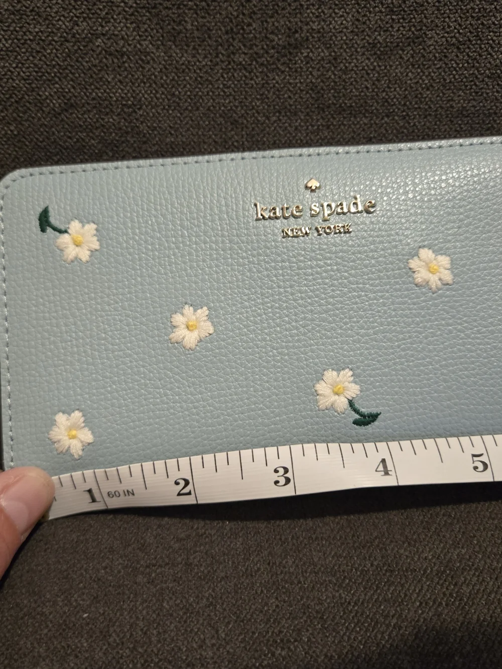 kate spade light blue daisy-embroidered continental wallet